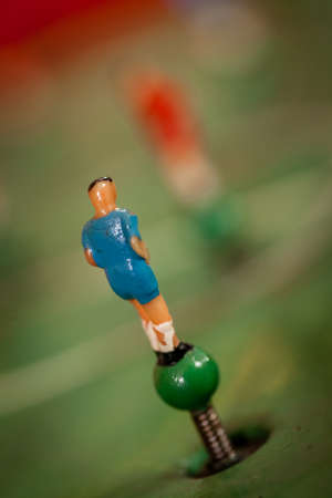 Close-up shot of red player of a tabletop football gameの写真素材