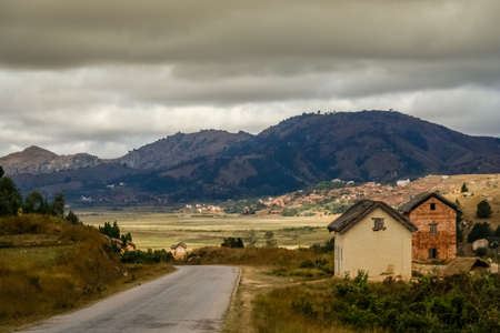 Road going through the Madagascar rural countryside, central Madagascarの写真素材