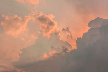 Horizontal picture of sunbeams and clouds in the sky