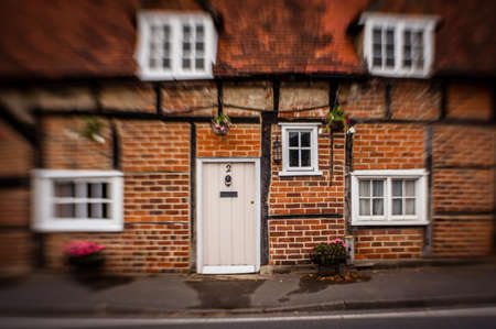 White doors to the traditional victorian english home in a small townのeditorial素材