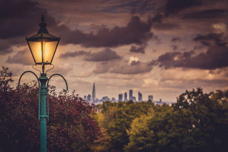 City of London as seen from the park in Forrest Hill at duskの写真素材