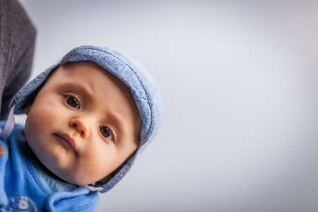 Portrait of a cute little baby boyの写真素材