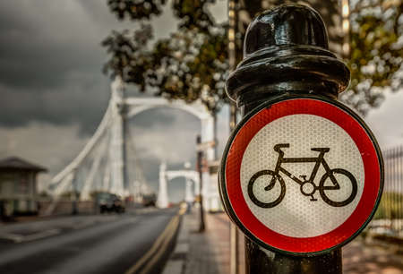 Sign forbidding cycling on the bridge in Londonの写真素材
