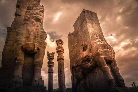 Gigantic stone sculptures at the entrance to the ancient city Persepolis in Iranの写真素材