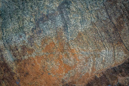Rough stone rocky grunge background texture of a wall