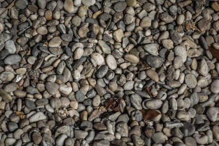 Background of stones and rocks on a beachの写真素材