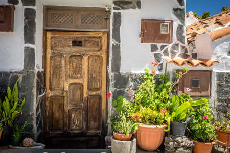Wooden doors to one of the homes in Fataga in Gran Canaria Canary Islandsの写真素材