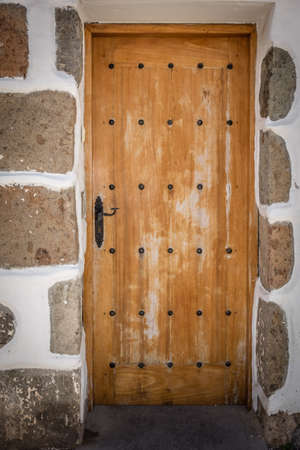 Wooden doors to one of the homes in Fataga in Gran Canaria Canary Islandsの写真素材