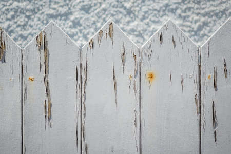 Close up of an odl withered white fenceの写真素材