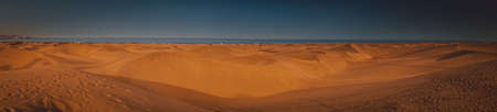 Panorama of the stunning sand dunes in  the Natural Reserve of Dunes of Maspaloma in Gran Canariaの写真素材