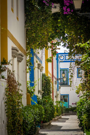 Pedestrian alley in the harbor area of Puerto de Mogan a small fishing port in Gran Canaria Canary Islands Spainの写真素材