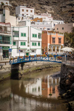 Small river canal in the Puerto de Mogan a small fishing port in Gran Canaria  called the Venice of Canaries  Canary Islands Spainのeditorial素材