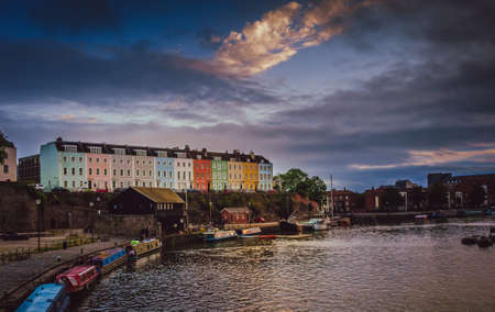 Colorful homes on the hillside in the harbour in Bristol, England, UKの写真素材