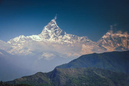 Mount Machhapuchhre dominating above city of Pokhara, Nepalの写真素材