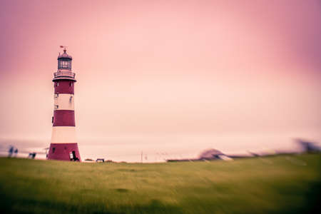 Lighthouse in Plymouth harbour on a rainy day, Devon, Englandの写真素材