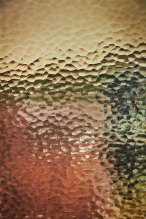Colorful frosted glass window on the doors of a hotel roomの写真素材