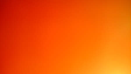 Defocused warm red and orange summer colors backgroundの写真素材
