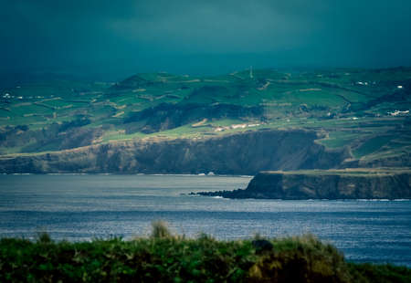 Cliffs of the stunningly beautiful coastline of Sao Miguel Island in the Azores, Portugalの写真素材