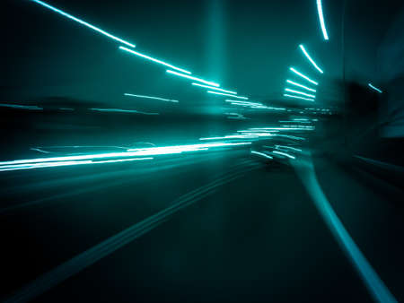 Picture of cold blueish random abstract light trails. Picture taken when driving at night.の写真素材