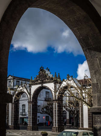 Famous arched monument Portas de Cidade in Ponta Delgada, Sao Miguel, Azores, Portugal.