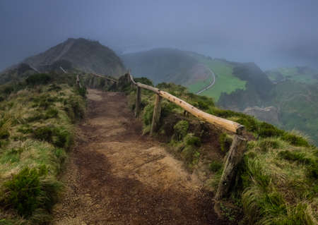 Walking path to the viewpoint of the Sete Cidades twin crater lakes,  Lagoa Verde and Lagoa Azul, Sao Miguel Island, Azores, Portugalの写真素材