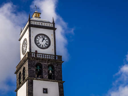 Clock tower of Church of San Sebastian at Ponta Delgada in Ponta Delgada, Sao Miguel Island, Azores, Portugalの写真素材