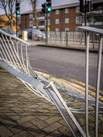 Damaged steel railing after car accident, London suburbの写真素材