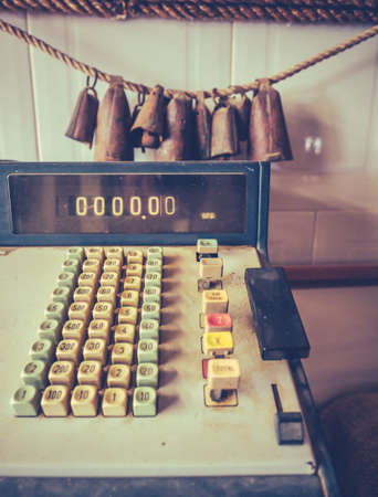 Details of an dirty old rusty vintage cash registerの写真素材
