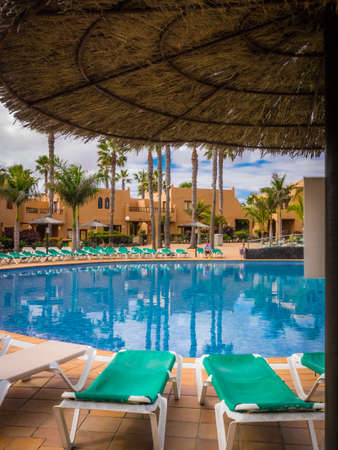 Large swimming pool in a resort in Fuerteventura, Canary Islands, Spain. Picture taken 11 April 2016のeditorial素材