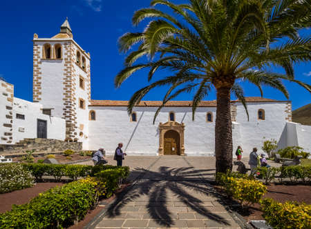 Tourists outside the gates of the Cathedral of St. Mary of Betancuria, Canary islands, Spain. Picture taken 13 April 2016のeditorial素材