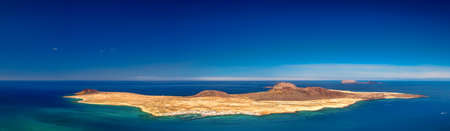 View of the La Graciosa, Allegranza and Montana Clara islands as seen from the Mirador del Rio, Lanzarote, Canary Islands, Spainの写真素材
