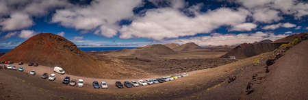Car parked at the entrance to the Timanfaya National Park ( also called The Montanas del Fuego or Mountains of Fire ) in Lanzarote, Canary Islands, Spainのeditorial素材