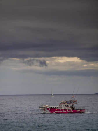 Small motorboat on a calm sea off the coast of Lanzarote, Canary Islands, Spain. Picture taken 18 April 2016のeditorial素材