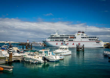Colorful boats in a harbour in Playa Blanca, Lanzarote, Canary Islands, Spain. Picture taken 19 April 2016のeditorial素材