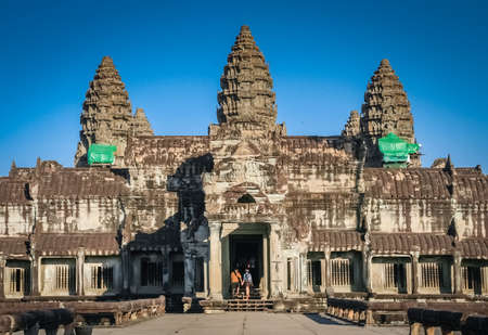 Angkor Wat, Cambodia -  August 2007: Group of tourist entering the Angkor Wat temple, Cambodiaのeditorial素材