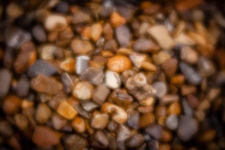 Soft focused blurred picture of a peebles on the ground in the gardenの写真素材