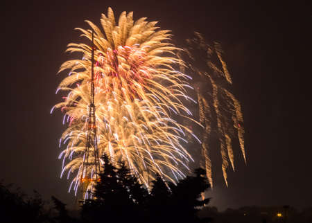Fireworks over Crystal Palaca transmitting station on the Guy Fawkes Night also known as Bonfire Night, Fireworks Night on the 5th of November, London, Englandの写真素材