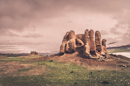 Remnants of a small tibetan dzong on the river shore, Central Tibetの写真素材