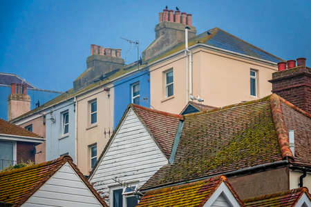 Colorful houses on a hillside in the old town of Hastings, East Sussex, England, UKの写真素材