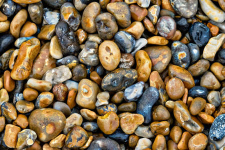 Picture of a pile of peebles on the ground on the beach