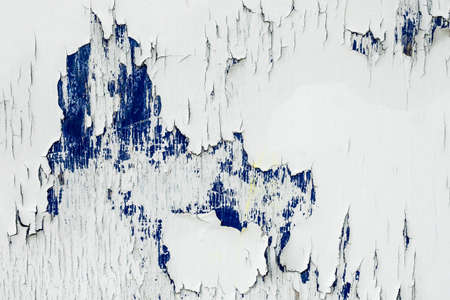 Close up of an old withered white fenceの写真素材