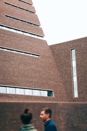 London, England - June 19, 2016: People walking by the exterior of Tate Modern building in London, UKのeditorial素材