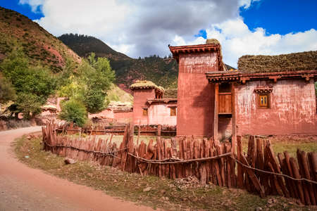 Traditional tibetan home in one of the small tibetan villages, Eastern Tibetの写真素材