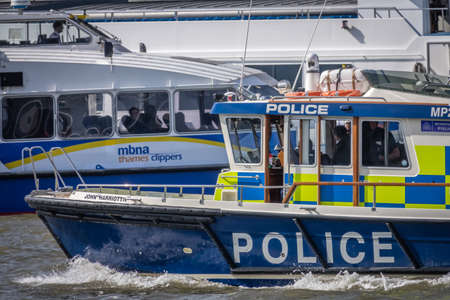 London, England -  25 March 2017 : River Police boat patrolling the River Thames, London, UK