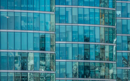 London, England -  25 March 2017 : Modern glass and steel facade of a commercial building in London, UKのeditorial素材