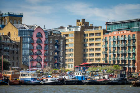London, England -  25 March 2017 : Barges and boats moored on river Thames, London, UKのeditorial素材