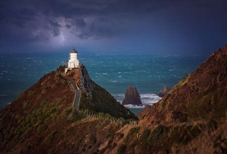 Lighthouse on the Nugget Point  stunning part of New Zealand south Island coastの写真素材