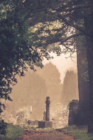 Old graves in a cemetery in Englandの写真素材