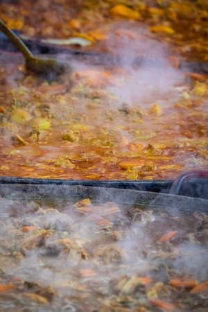 Ready curry meals for sale on the street food market in Londonの写真素材