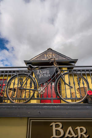 Bunratty castle, Ireland -  April 2017 : Old retro vintage bicycle in front of a traditional irish pub,  county Clare, Irelandのeditorial素材